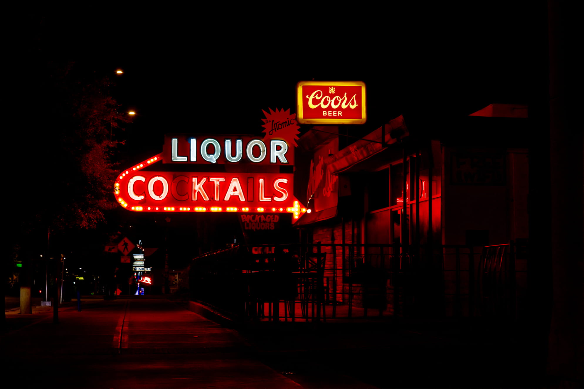 Atomic Liquors sign at night in Las Vegas