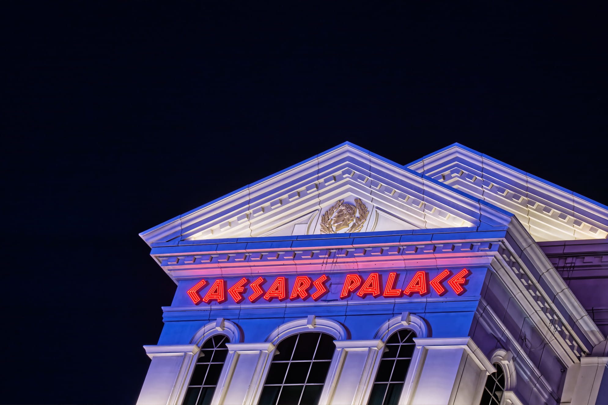 Caesars Palace at night on the Las Vegas Strip