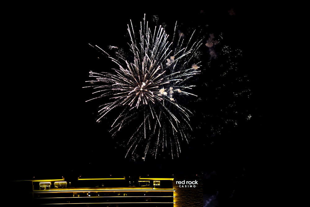 White firework burst over Red Rock Hotel and Casino in Las Vegas's most affluent community—Summerlin.